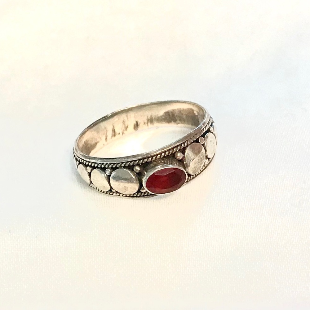 Sterling silver ring with garnet stone